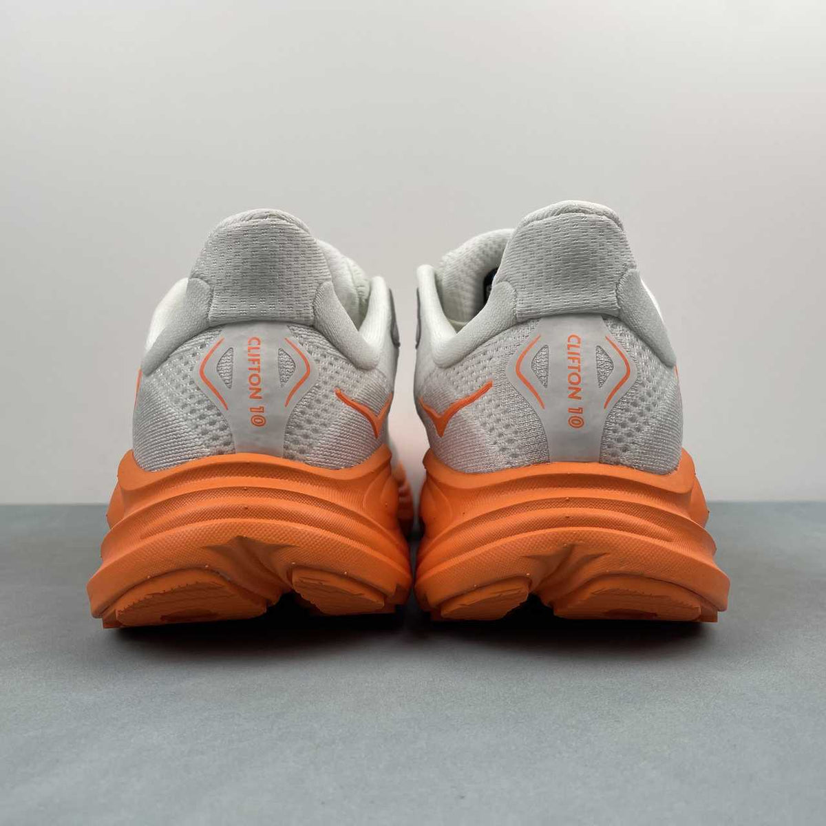 HOKA ONE ONE Clifton   White & Orange Lace-Up Sneakers