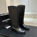 Chanel Quilted Knee-High Riding Boots in Black Calfskin