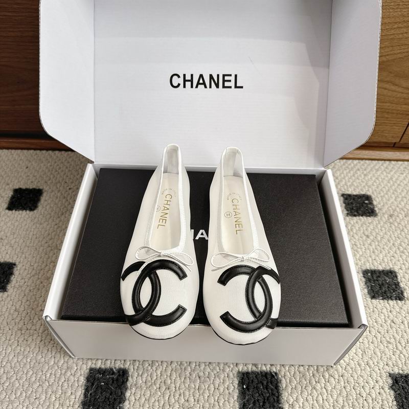 Chanel White Slip-On Shoes with Black Interlocking Logo Detail