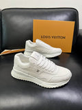 Louis Vuitton Run Away Sneaker in white, shown in pairs with original orange LV box