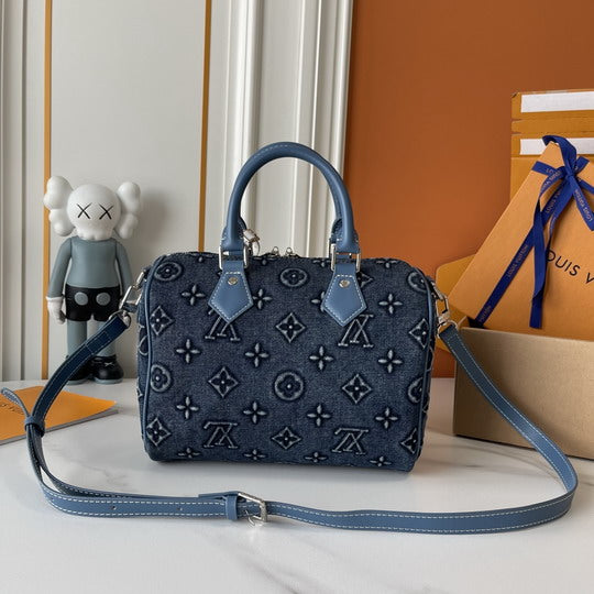 Louis Vuitton Speedy Handbag in Dark Blue Embossed Monogram