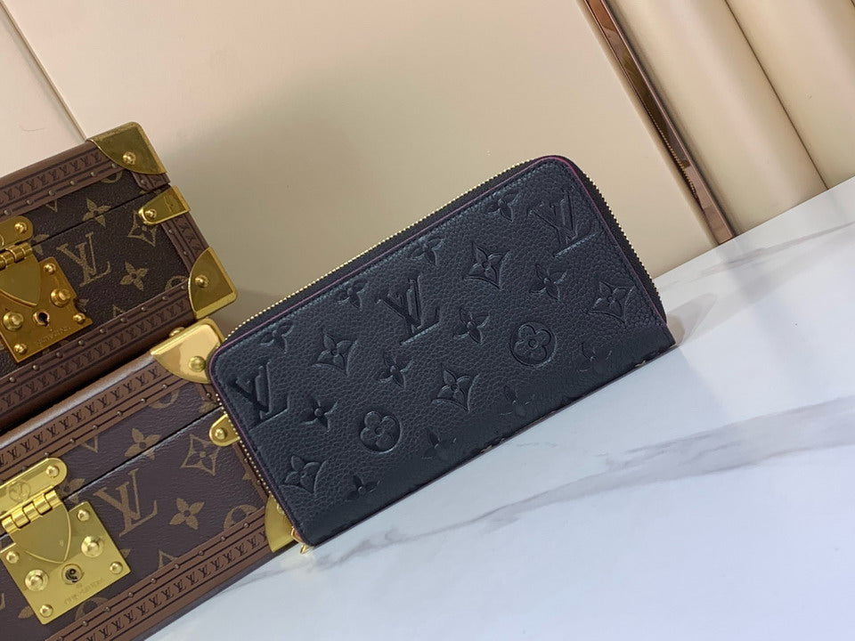 Monogram Embossed Zip-Around Wallet
